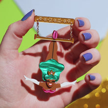 Load and play video in Gallery viewer, Erstwilder A Day At The Fair Trapeze With Ease Acrylic Brooch
