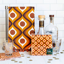 Load image into Gallery viewer, Mid Century Amber Circles &amp; Waves Dish Towel With Pom Pom Trim
